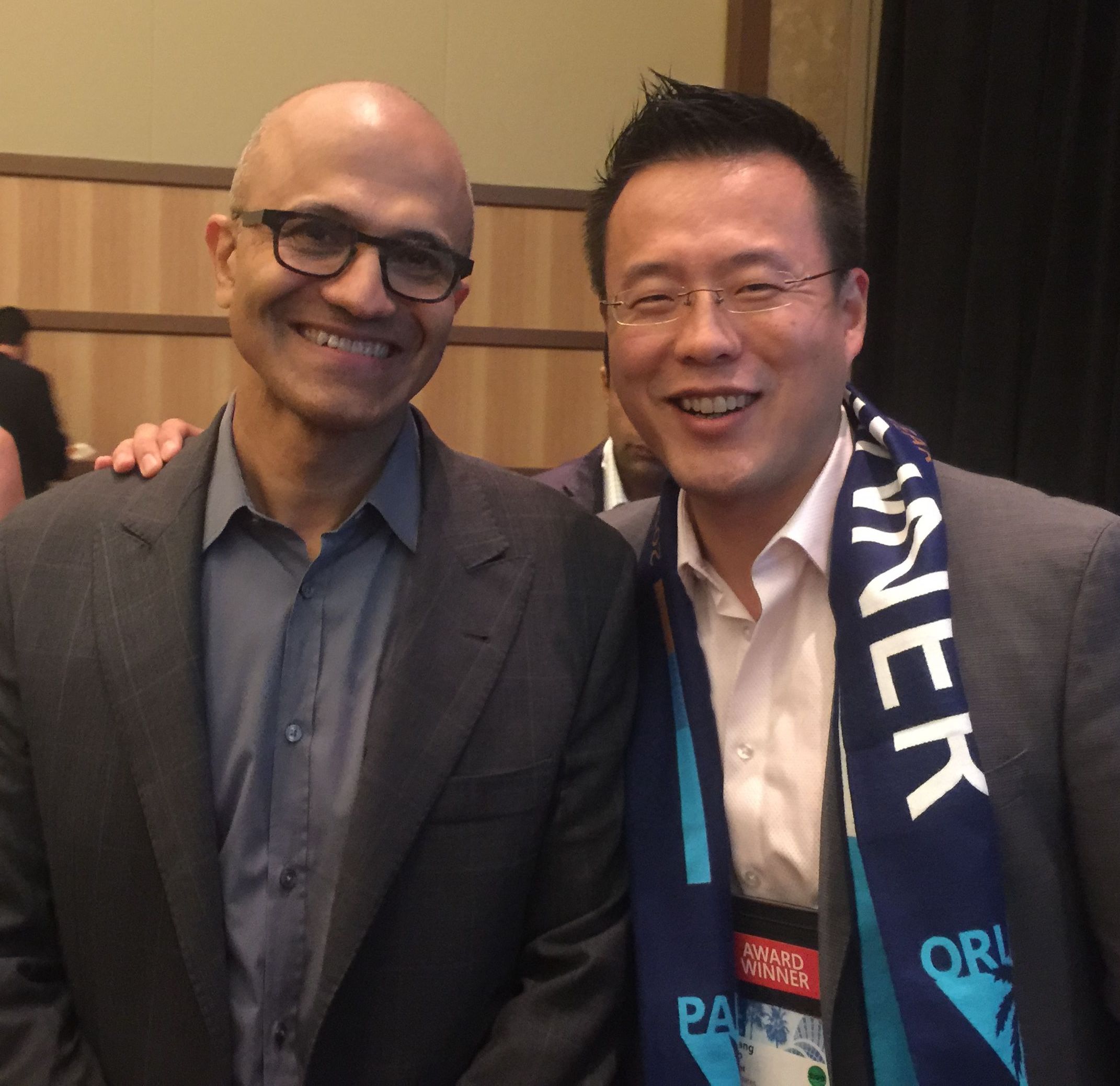Microsoft CEO Satya Nadella and AvePoint Co-CEO and Co-Founder Dr. Tianyi (TJ) Jiang)