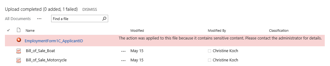 Warning message in SharePoint informing the user that they uploaded a file containing sensitive content.