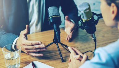 Radio interview podcast recording business people talking in studio picture id1330934437