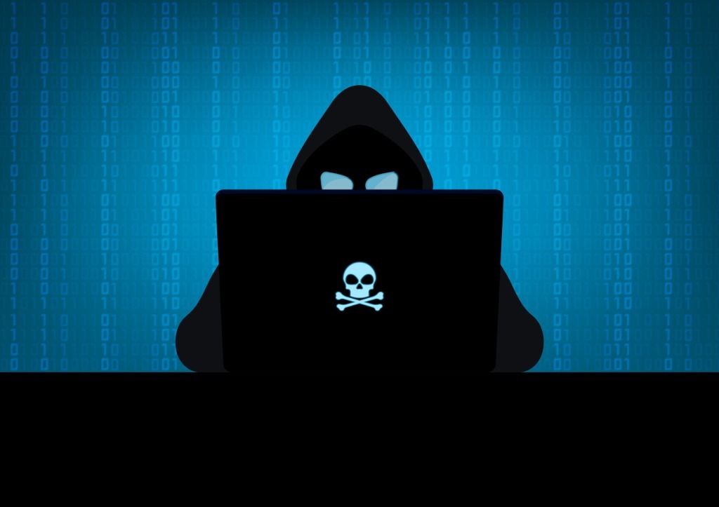 Hacker in the dark vector id1264284948